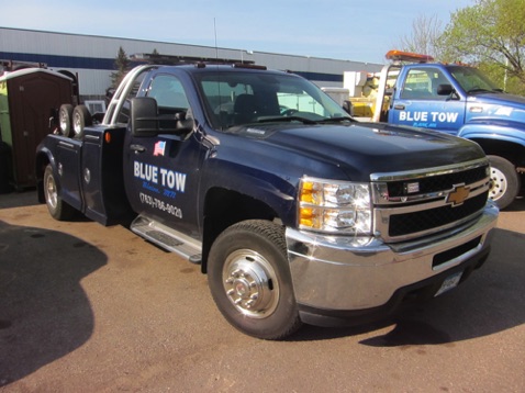 Blue Tow tow trucks-neither one a Dodge!