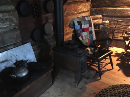 Old wood stove inside shop