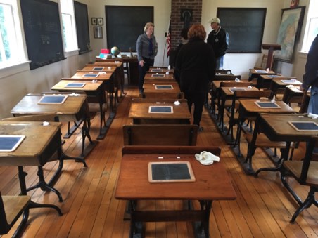 School desks and our tour guide Bev