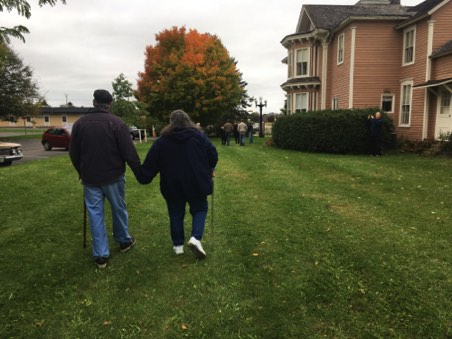 Gregg and Becky walking toward the main house