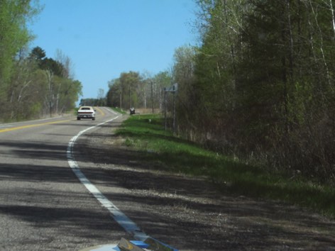 Gary and Heidi Keim, 1989 LeBaron Convertible on the road ahead